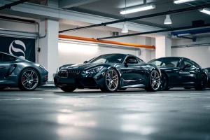 Exclusive custom wheels for luxury vehicles, featuring intricate forged alloy designs with polished chrome and matte black finishes, mounted on high-end sports cars and sedans in a sleek urban garage setting with soft ambient lighting, emphasizing craftsmanship and premium automotive detail