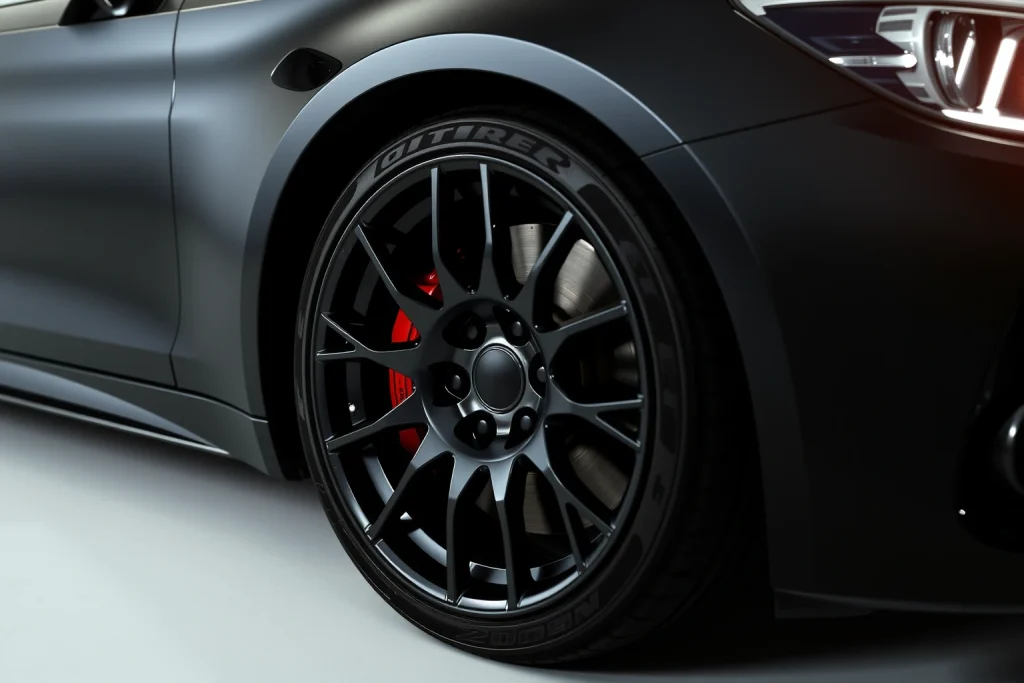 A set of high-end, glossy black alloy wheels with intricate multi-spoke design, mounted on a sleek luxury sedan under soft studio lighting, emphasizing reflective surfaces and precision engineering, no text or logos visible